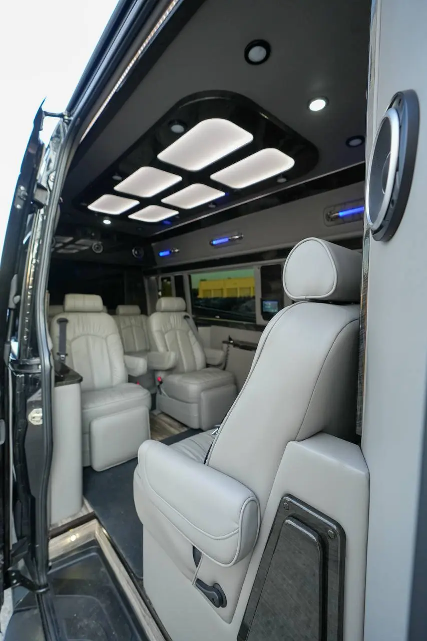 Executive Sprinter interior with individual leather captain chairs