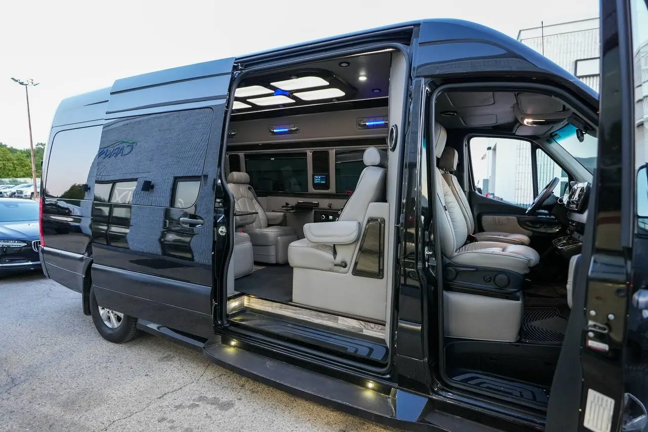 Black executive Sprinter with its passenger cabin open